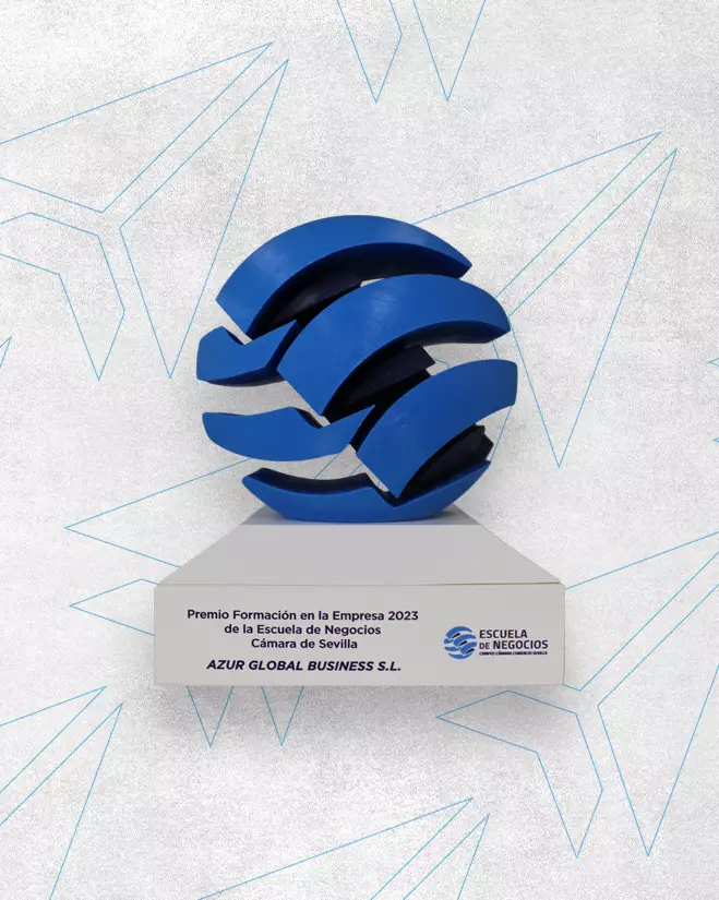Premio a la Formación en la Empresa [Cámara de Comercio de Sevilla]. Imagen que describe un trofeo de reconocimiento por formación.
